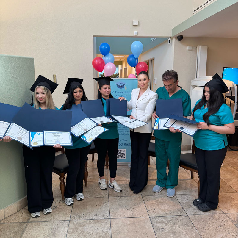 students graduating from A&K Dental Assistant Academy