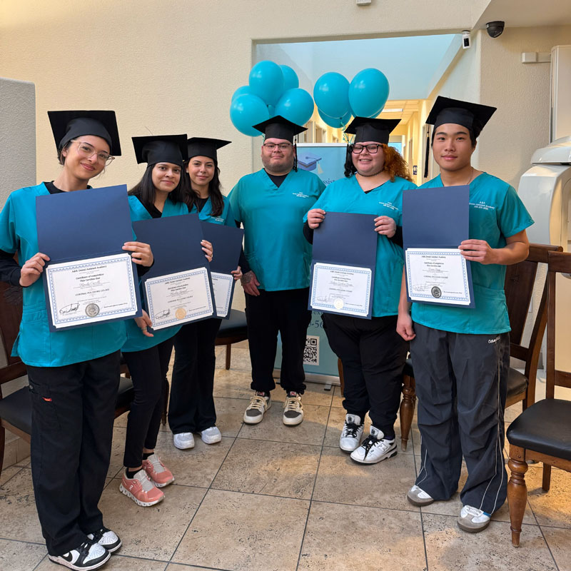 students graduating from A&K Dental Assistant Academy