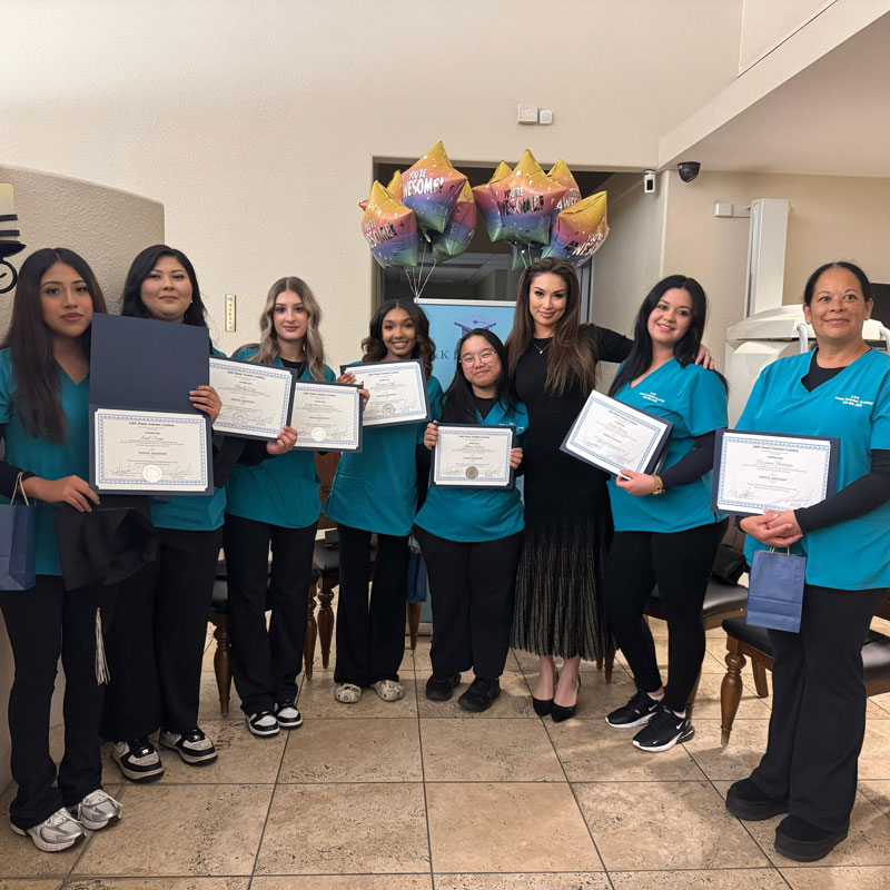 students graduating from A&K Dental Assistant Academy