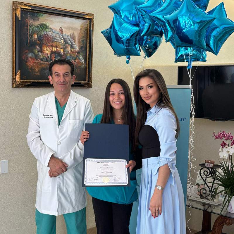 student-receiving-dental-training-certificate